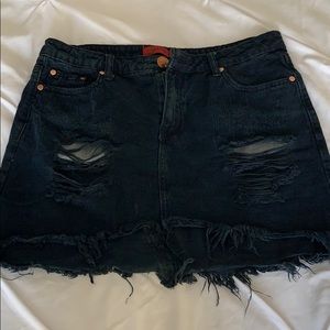 Black jean skirt with cuts and fringe so cute!